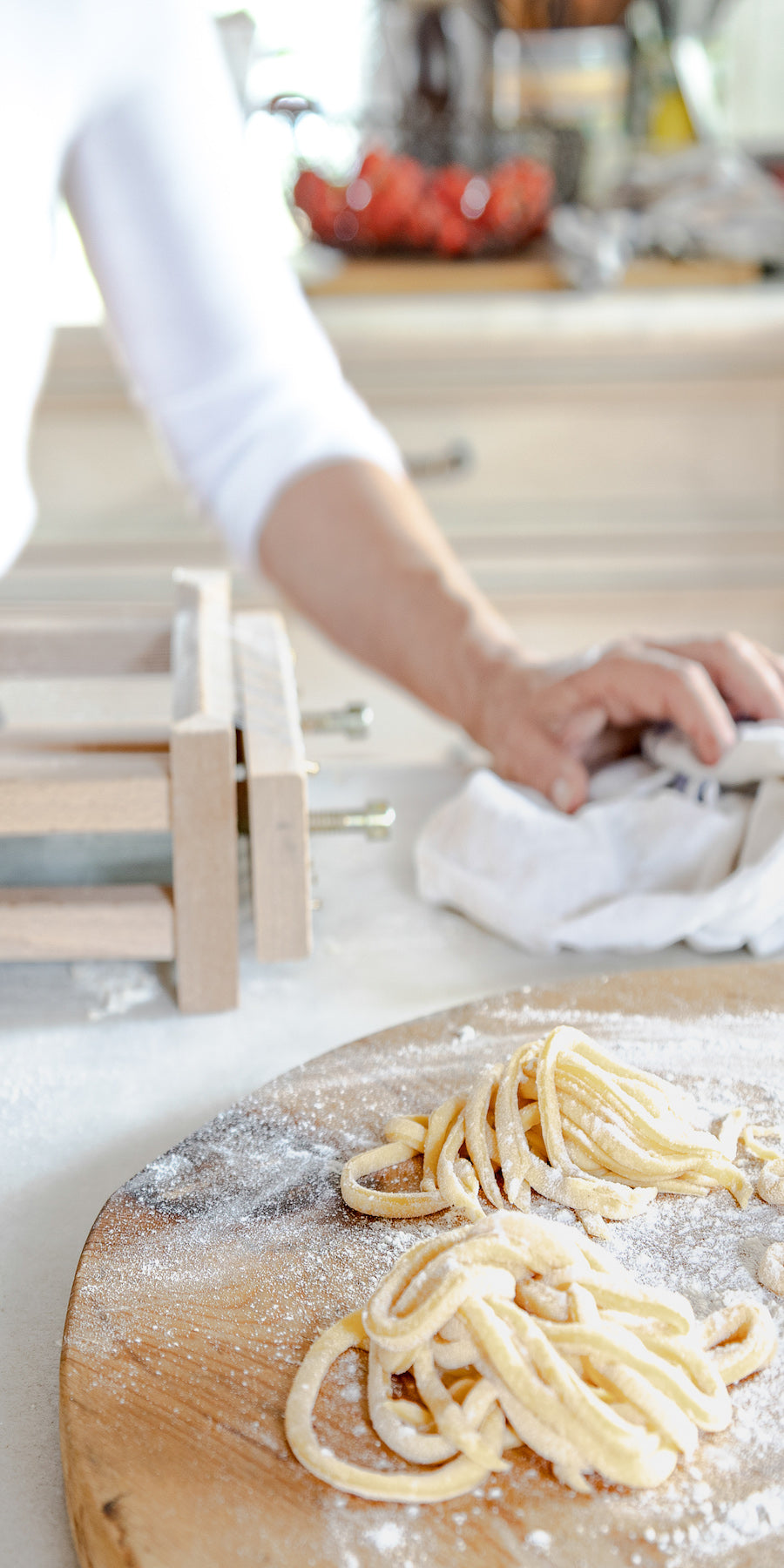 Our Italian Table mobile image woman with pasta